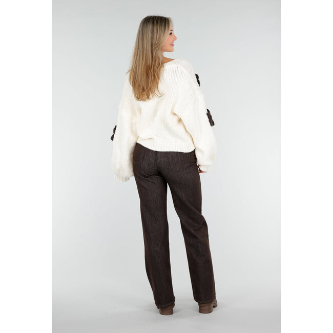 Strickjacke in Creme mit dunkelbraunen Schleifen
