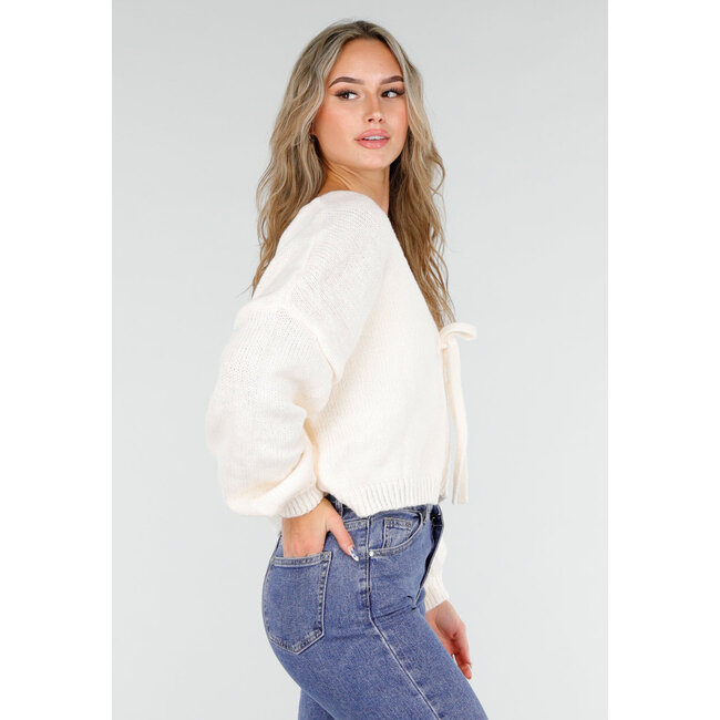 Beige gestrickte Strickjacke mit Schleife vorne