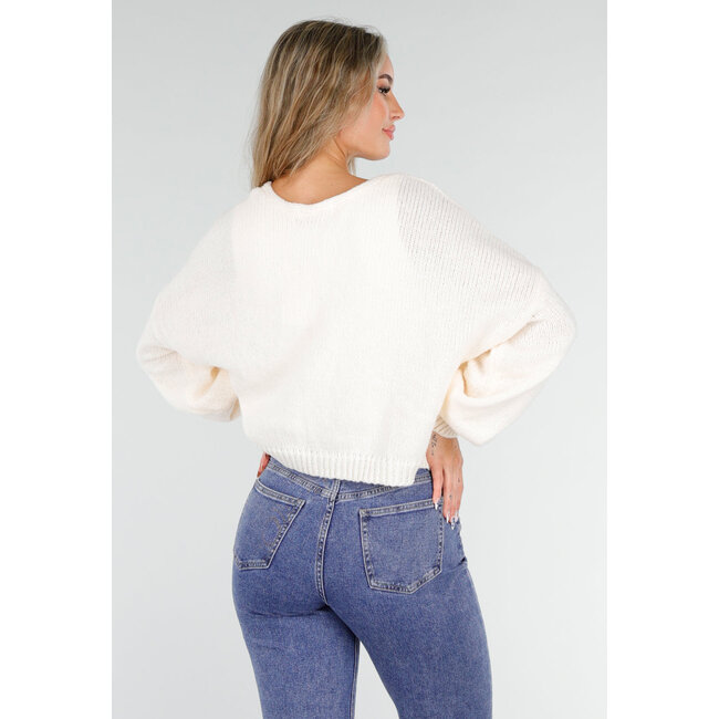 Beige gestrickte Strickjacke mit Schleife vorne