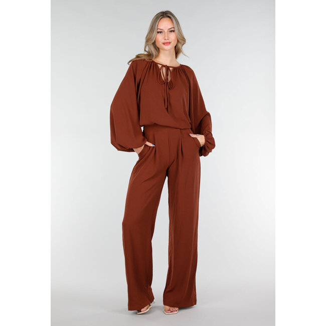 Terrakottafarbene Stretchbluse mit Schleifenverschluss und weiten Ärmeln