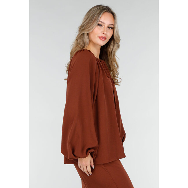 Terrakottafarbene Stretchbluse mit Schleifenverschluss und weiten Ärmeln