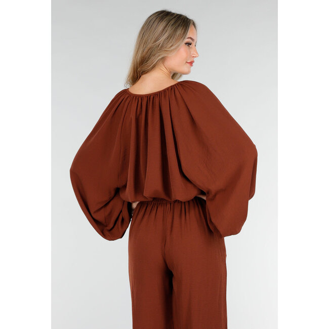 Terrakottafarbene Stretchbluse mit Schleifenverschluss und weiten Ärmeln