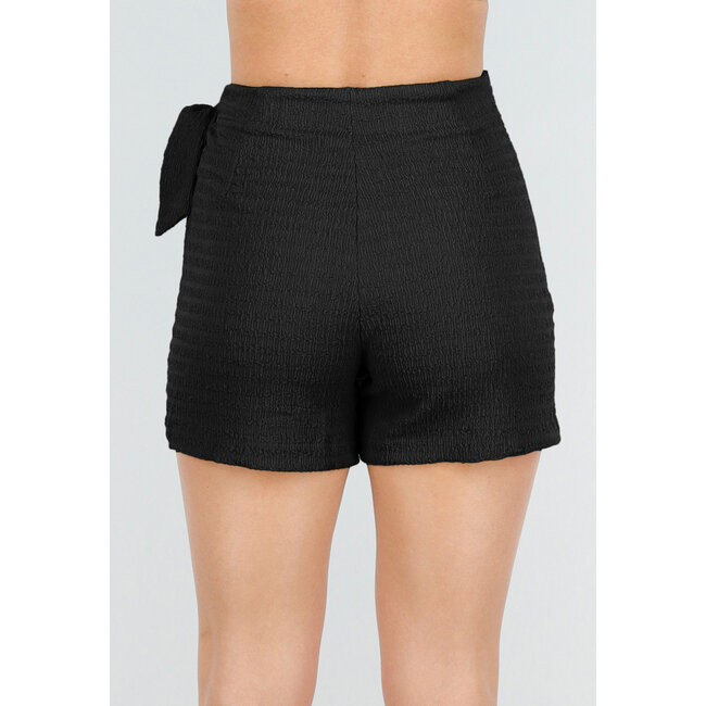 Schwarzer Stretch-Skort mit Schleifenverschluss und leicht strukturiertem Material