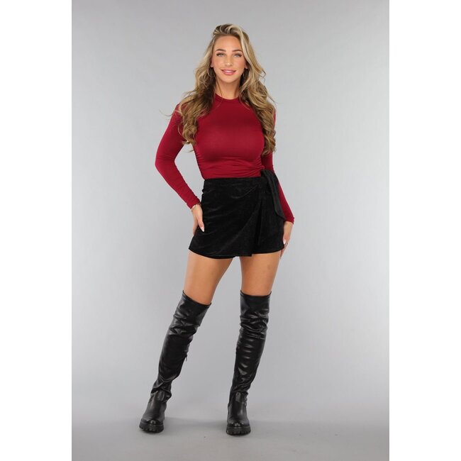 Skort mit Samtrevers und Schleifenverzierung