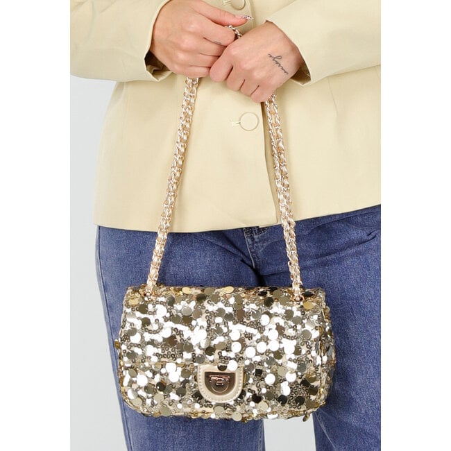 Goldene Glitzertasche