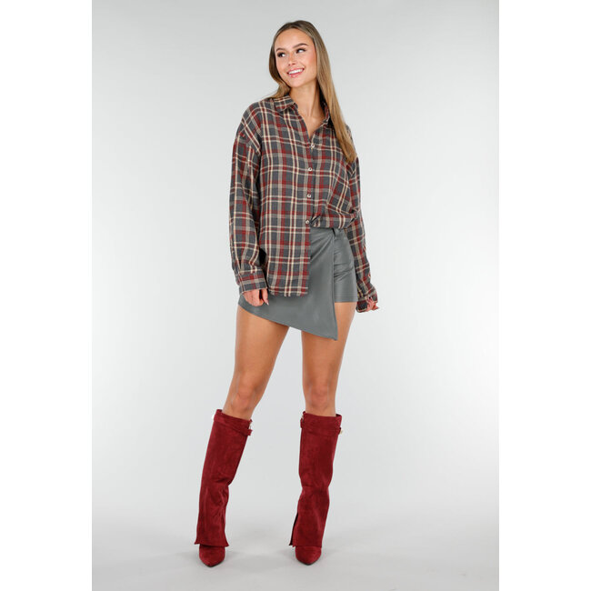 Dunkelgrüner Lederlook Asymmetrischer Skort mit schrägem Überwurf