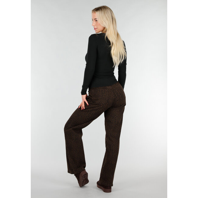 Schwarzes Oberteil mit Cut-Out und goldenem Detail