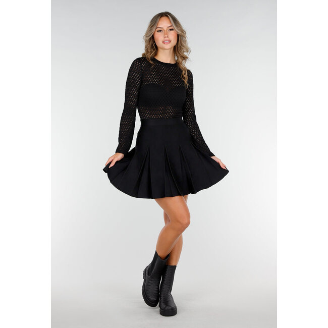 Schwarzer Faltenrock aus gestricktem Stretch-Stoff