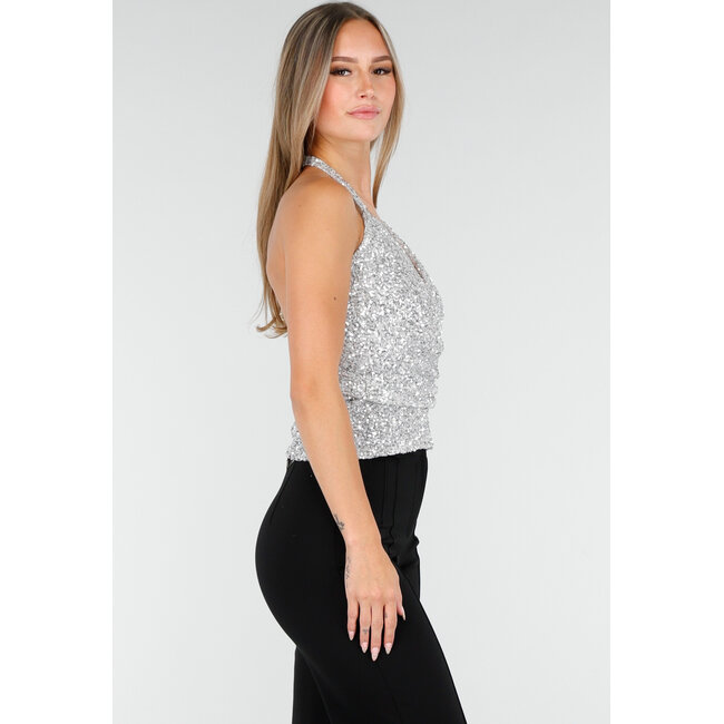 Silbernes Neckholder-Top mit Glitzer und offenem Rücken