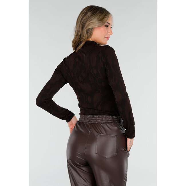 Schwarzes Jacquard-Oberteil mit langen Ärmeln, Rollkragen und Stretchanteil