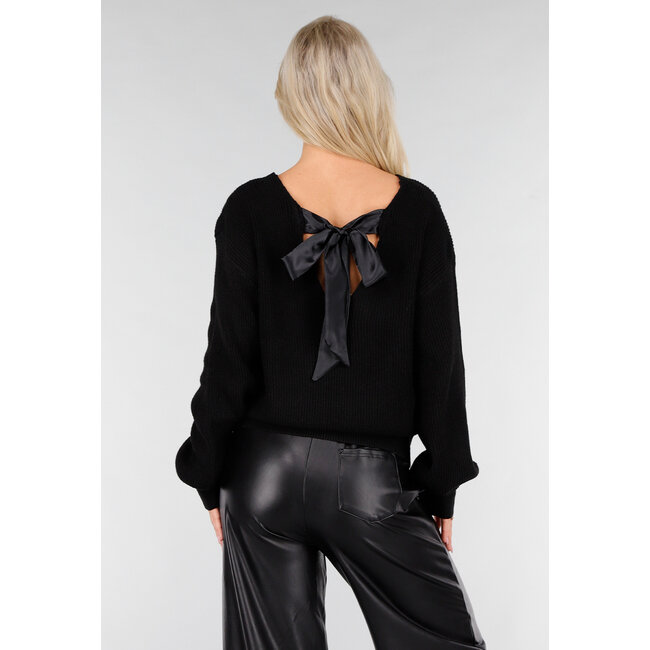 Schwarzer Strickpullover mit tiefem V-Ausschnitt und lockerer Passform