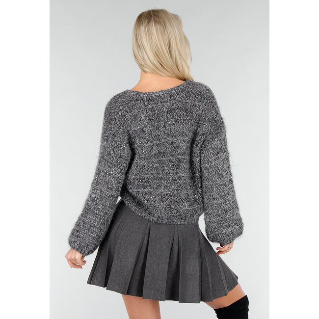 Dunkelgraue Strickjacke mit Schleifeknöpfen und dezenten Glanzdetails