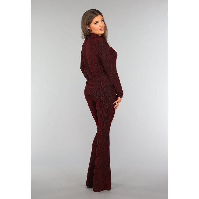 Rote Glitzerbluse mit Zickzack-Muster