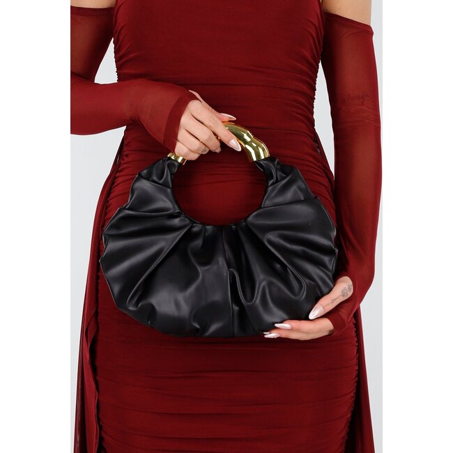 Handtasche mit goldenem Griff