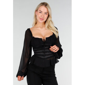 Schwarzes Oberteil mit Spitze und Rüschen