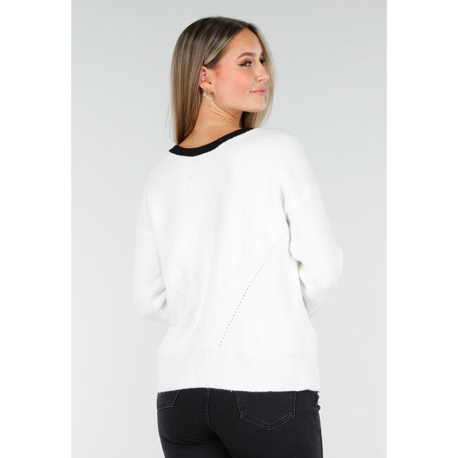 Weißer Cardigan mit schwarzen Schleifen und langen Ärmeln