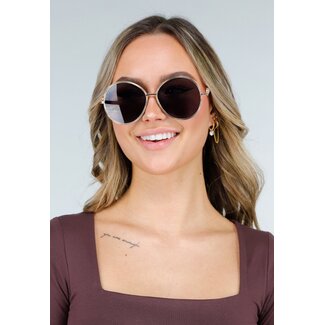 Goldfarbene dunkle runde Sonnenbrille