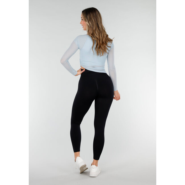 Hellblaues asymmetrisches Mesh-Oberteil mit langen Ärmeln und Polstern