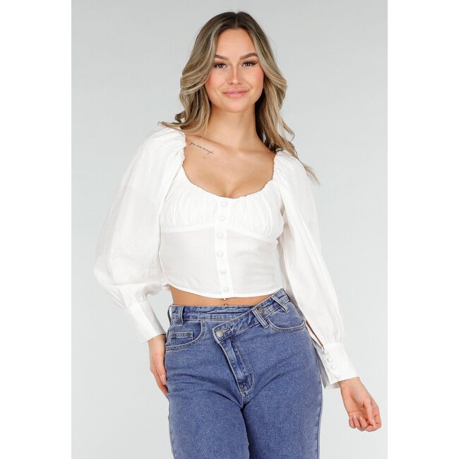 Weiße Bluse mit langen Puffärmeln und Knöpfen