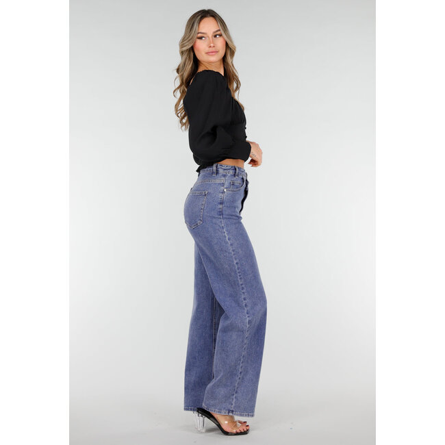 Schwarze Bluse mit langen Puffärmeln und Knöpfen