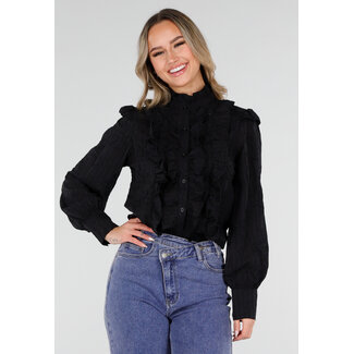 Schwarze Bluse mit Rüschen