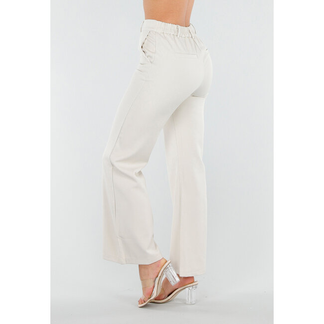 Beigefarbene Schlaghose mit elastischem Bund