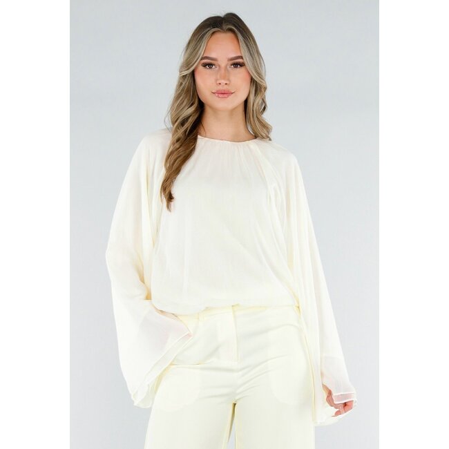 Buttergelbe Bluse mit weiten Ärmeln