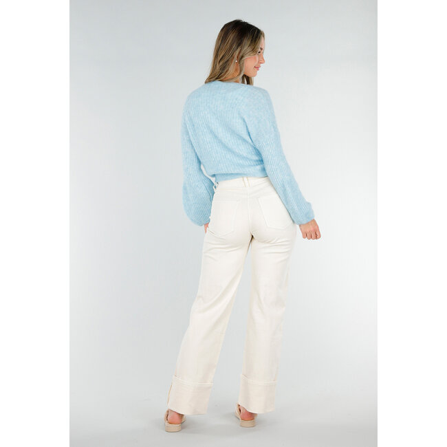 Hellblauer Wollwickelpullover mit Schleifendetail