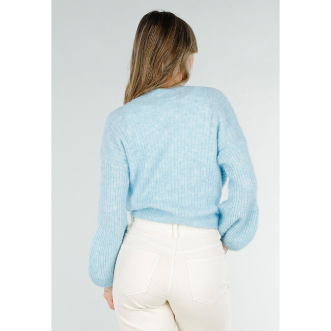 Hellblauer Wickelpullover mit Schleifendetail