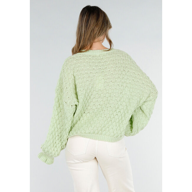 Mintgrüner Strickpullover mit V-Ausschnitt