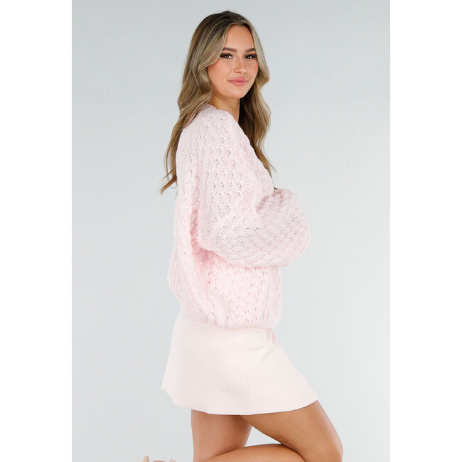 Hellrosa Strickpullover mit V-Ausschnitt