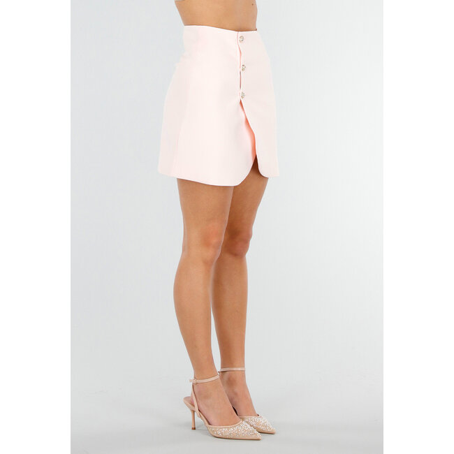 Hellrosa Wickelrock mit Strassknöpfen