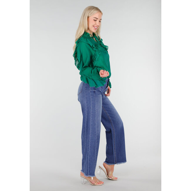 Blaue Mid Waist Wide Leg Jeans mit dezenter Waschung und ausgefranstem Saum