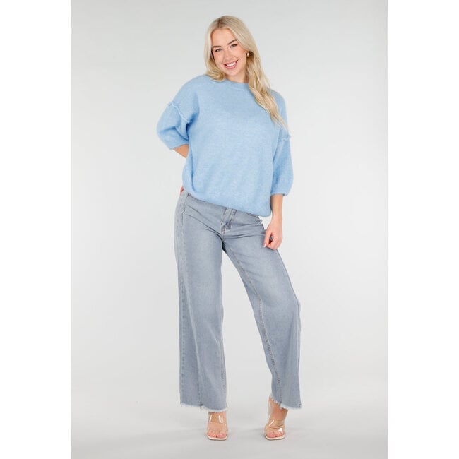 Hellblaue Mid Waist Wide Leg Jeans mit ausgefranstem Saum