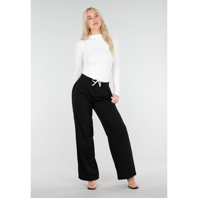 Schwarze Hose mit weitem Bein, weißem Bund und Schleifendetail