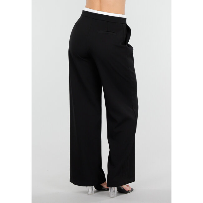 Schwarze Hose mit weitem Bein, weißem Bund und Schleifendetail