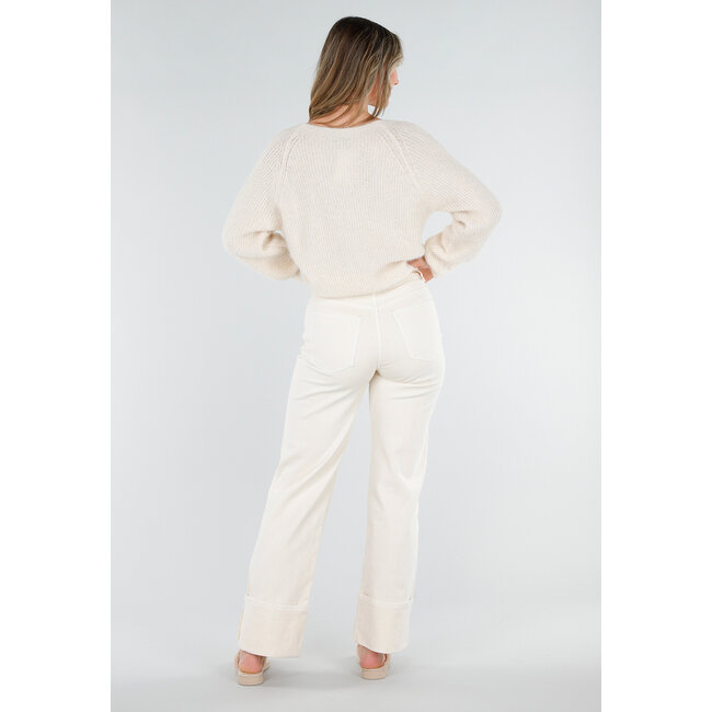 Beigefarbener, gestrickter Twist-Crop-Pullover mit langen Ärmeln und V-Ausschnitt