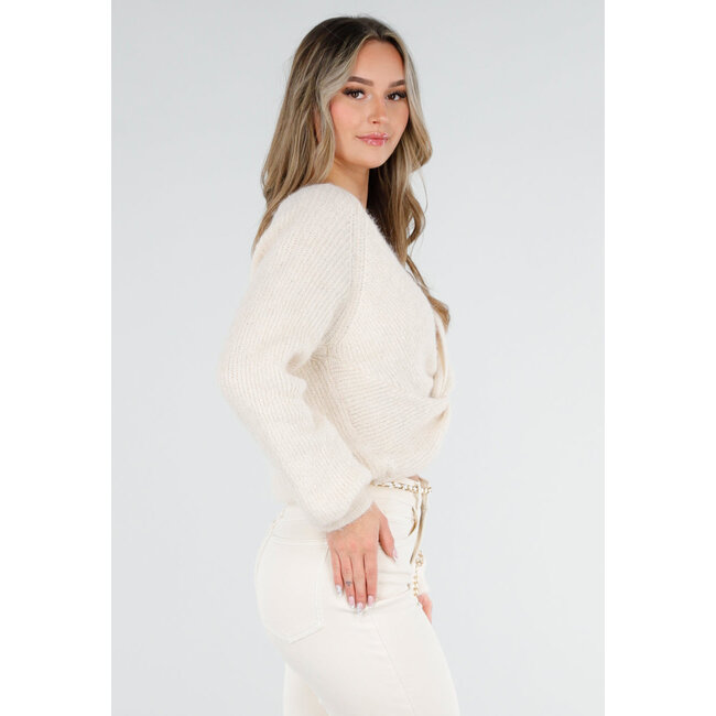 Beigefarbener, gestrickter Twist-Crop-Pullover mit langen Ärmeln und V-Ausschnitt