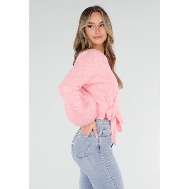 Rosa, fein gestrickte Wickeljacke mit Schleifendetail und Ballonärmeln