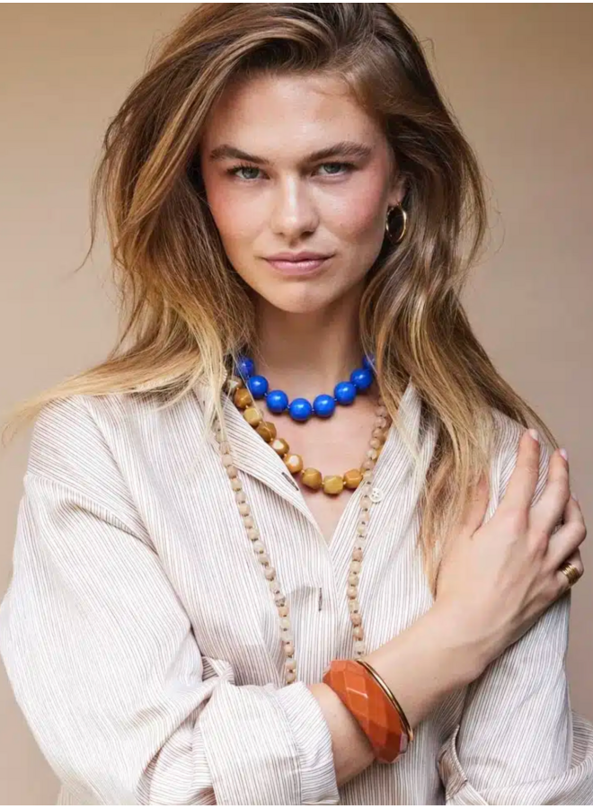 Ellen Beekmans Facet geslepen bangle gelakte hars