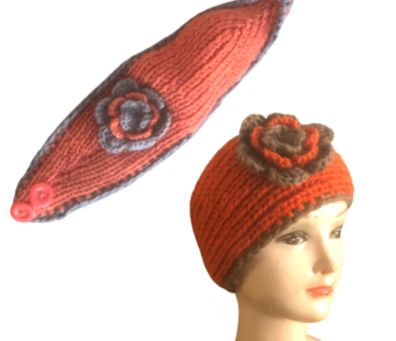 Handgebreide hoofdband bloem oranje