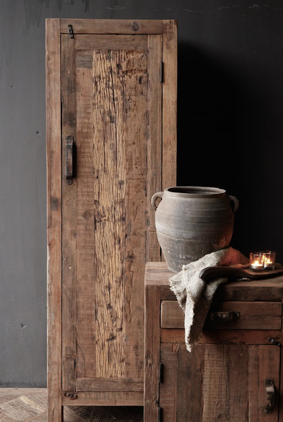 Tough a door cupboard made of old wood