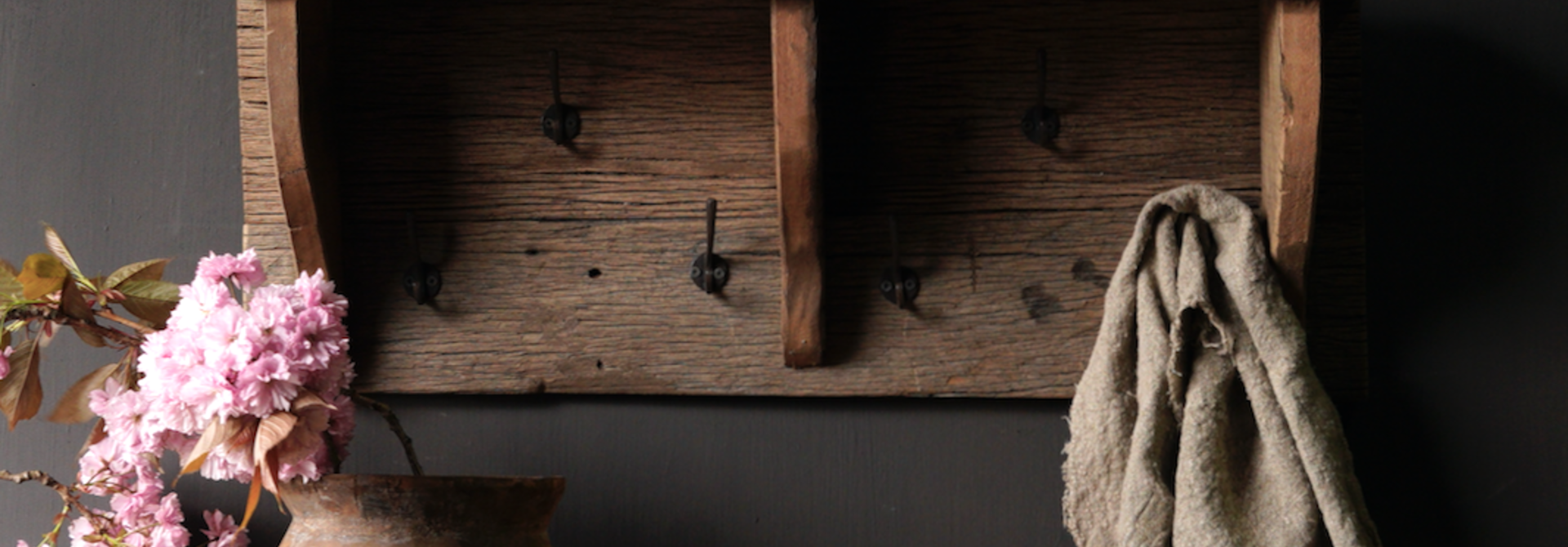 Coat rack / Wall console made of old used wood with iron hooks