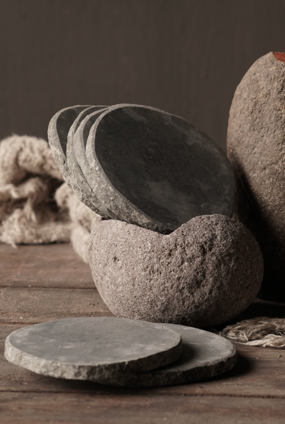 Natural stone coasters in a pebble holder