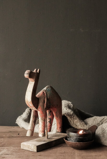 Unique wooden figurine camel