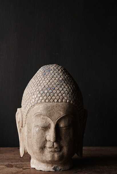 Natural stone Buddha head