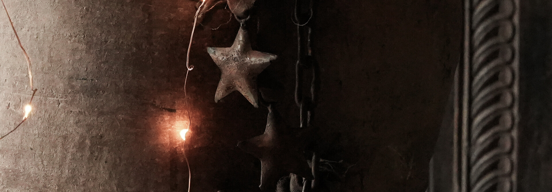 Beautiful rust brown iron bell with stars