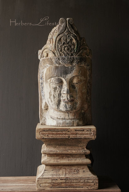 Unique wooden Buddha head