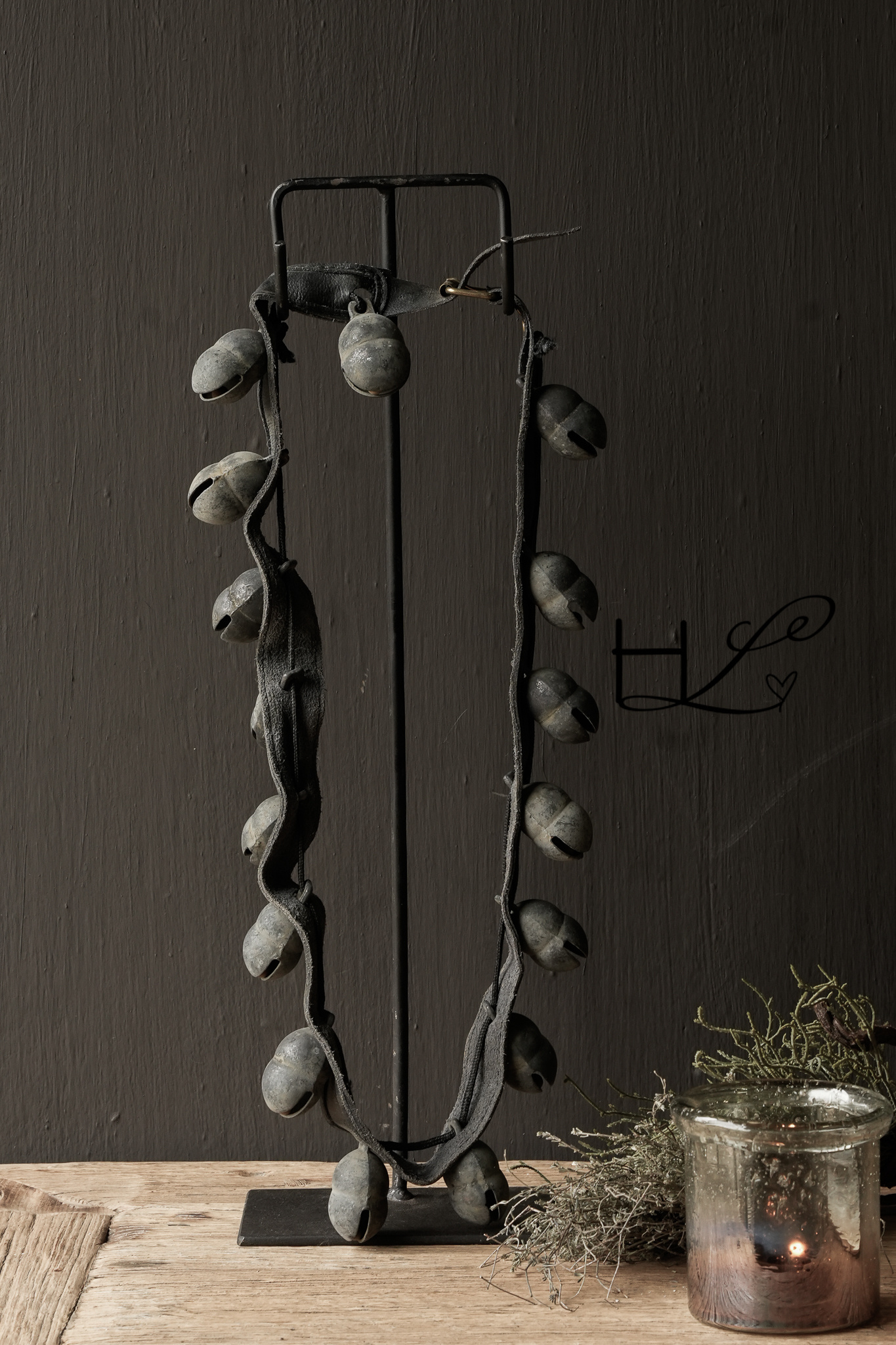 Leather belt with iron camel bells on stand-1