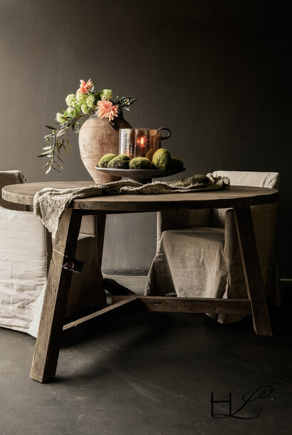 Tough old wooden round table with cross legs